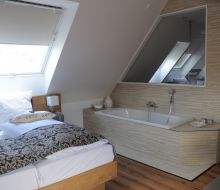 Zimmer mit Badewanne im Hotel ten Hoopen Warburg-Germete