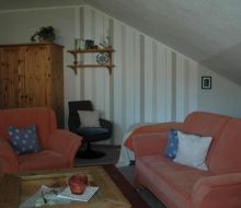 Couch in Wohnzimmer in der Ferienwohnung Hoppe Warburg